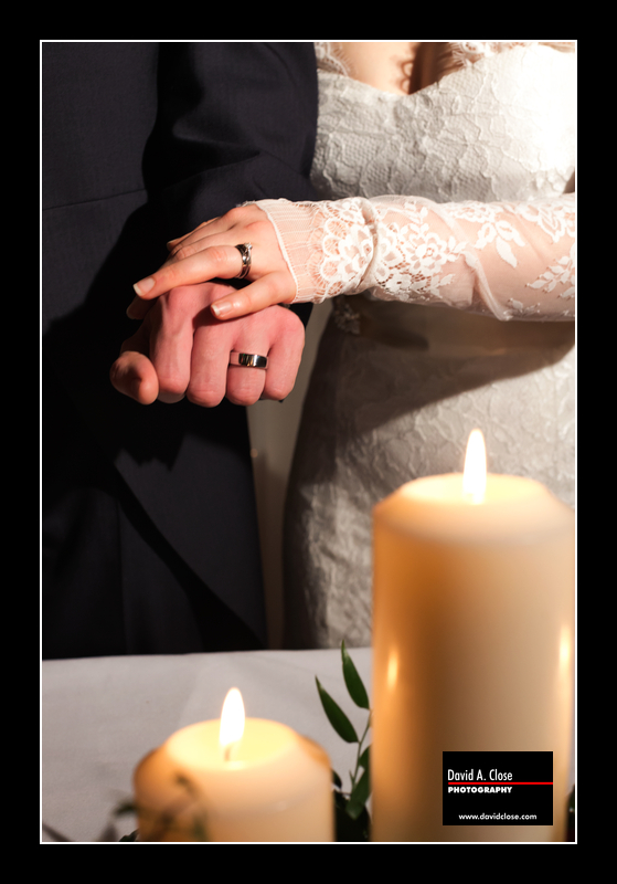 Bride and Groom wearing wedding rings
